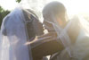 Image of newly weds kissing