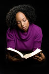 image of young lady studying Bible